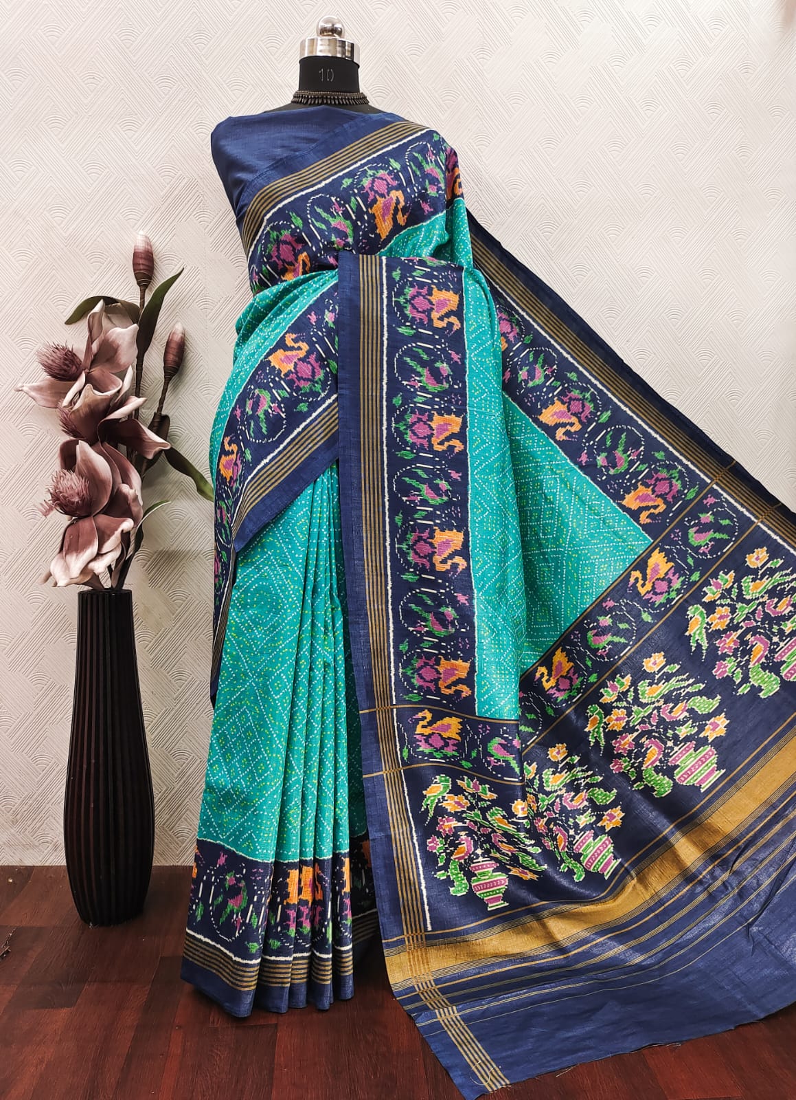 Turquoise Ikkat With Navy Blue Patola Print Color on Raw ArtSilk Fabric